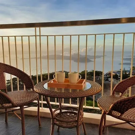 1 Bedroom Cozy Farmhouse-Style Condo With Balcony & Taal View At Wind Residences